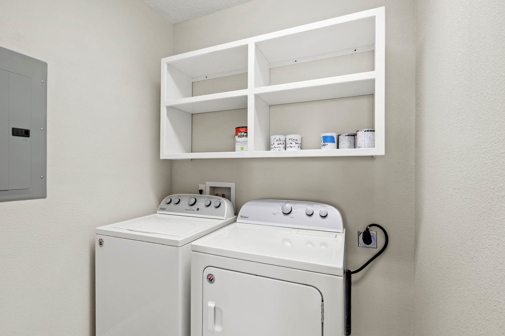 laundry room with white machines